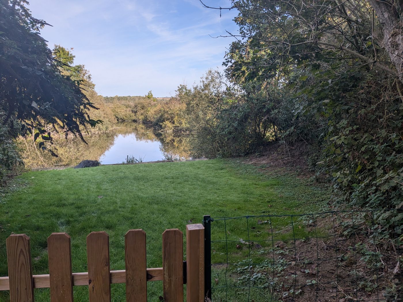 Private fishing pitch on a grassy bank
