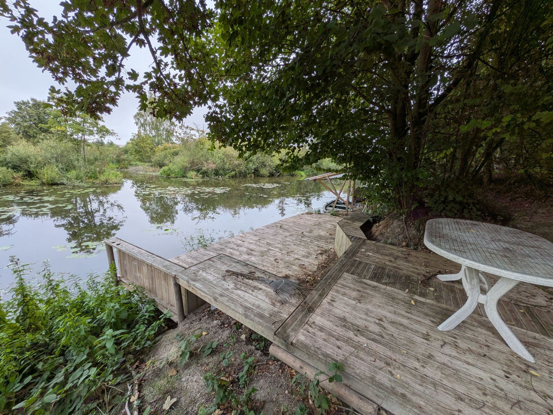 Wooden platform by the pond