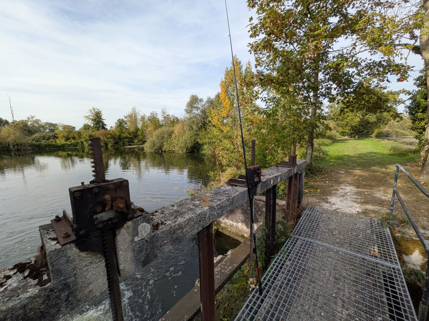 Old sluice gate and footbridge on the fishing route